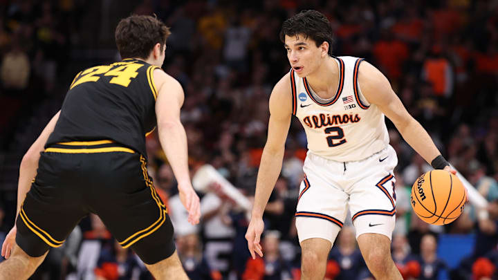 Mar 28, 2026; Houston, TX, USA; Illinois Fighting Illini guard Andrej Stojakovic (2) controls the ball against Iowa Hawkeyes guard Tate Sage (24) in the first half during an Elite Eight game of the South Regional of the men's 2026 NCAA Tournament at Toyota Center. Mandatory Credit: Troy Taormina-Imagn Images
