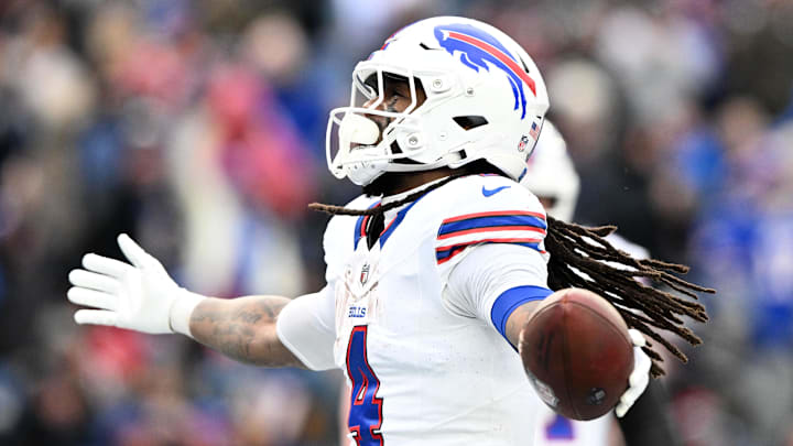Buffalo Bills running back James Cook (4) reacts after scoring a touchdown against the New England Patriots during the second half at Gillette Stadium. 