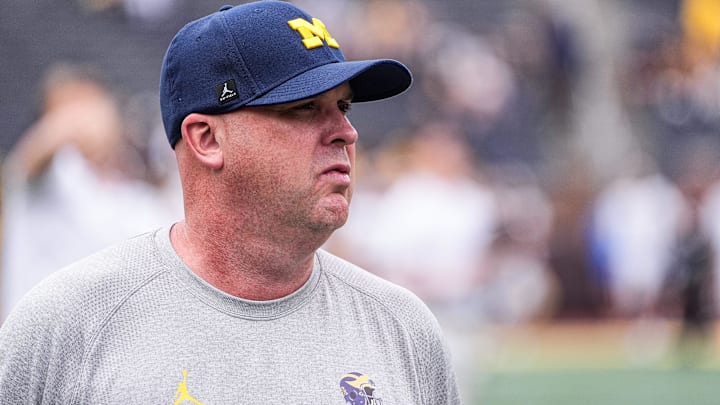 Michigan offensive coordinator Chip Lindsey watches warm up ahead of the Central Michigan game at Michigan Stadium in Ann Arbor on Saturday, Sept. 13, 2025.