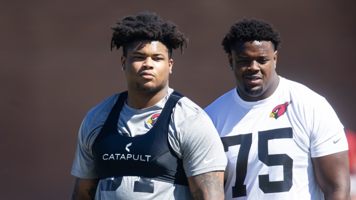 May 10, 2024; Tempe, AZ, USA; Arizona Cardinals offensive lineman Myles Murphy (57) and Christian Jones (75) during rookie minicamp at the teams Tempe Training Facility. Mandatory Credit: Mark J. Rebilas-USA TODAY Sports May 10, 2024; Tempe, AZ, USA; Arizona Cardinals offensive lineman Myles Murphy (57) and Christian Jones (75) during rookie minicamp at the teams Tempe Training Facility. Mandatory Credit: Mark J. Rebilas-USA TODAY Sports