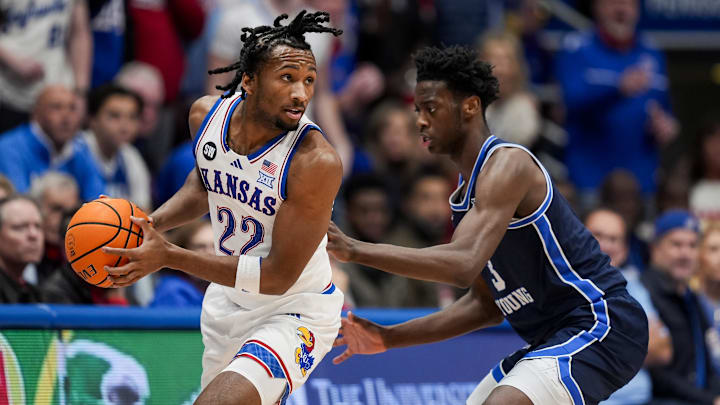 Jan 24, 2026; Columbia, Missouri, USA; Kansas Jayhawks guard Darryn Peterson (22) looks to pass against BYU Cougars forward AJ Dybantsa (3) during the first half at Mizzou Arena. Mandatory Credit: Jay Biggerstaff-Imagn Images