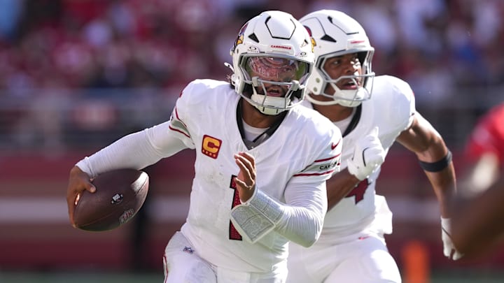 Oct 6, 2024; Santa Clara, California, USA; Arizona Cardinals quarterback Kyler Murray (center) carries the ball against the San Francisco 49ers during the fourth quarter at Levi's Stadium. Mandatory Credit: Darren Yamashita-Imagn Images Oct 6, 2024; Santa Clara, California, USA; Arizona Cardinals quarterback Kyler Murray (center) carries the ball against the San Francisco 49ers during the fourth quarter at Levi's Stadium. Mandatory Credit: Darren Yamashita-Imagn Images