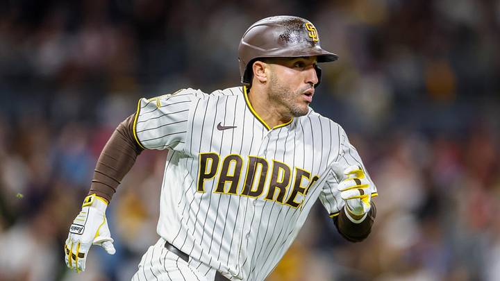 May 26, 2026; San Diego, California, USA; San Diego Padres right fielder Ramon Laureano (5) hits a one run home run during the eighth inning against the Philadelphia Phillies at Petco Park. Mandatory Credit: David Frerker-Imagn Images