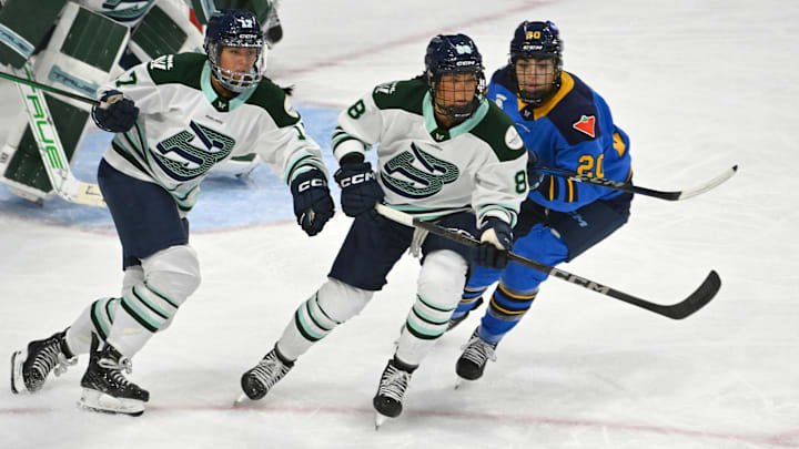 Nov 30, 2024; Toronto, ON, CANADA;  Boston Fleet forwards Lexie Adzija (88) and Taylor Girard (17) pursue the play against Toronto Sceptres forward Sarah Nurse (20) in the third period at Coca-Cola Coliseum. Mandatory Credit: Dan Hamilton-Imagn Images