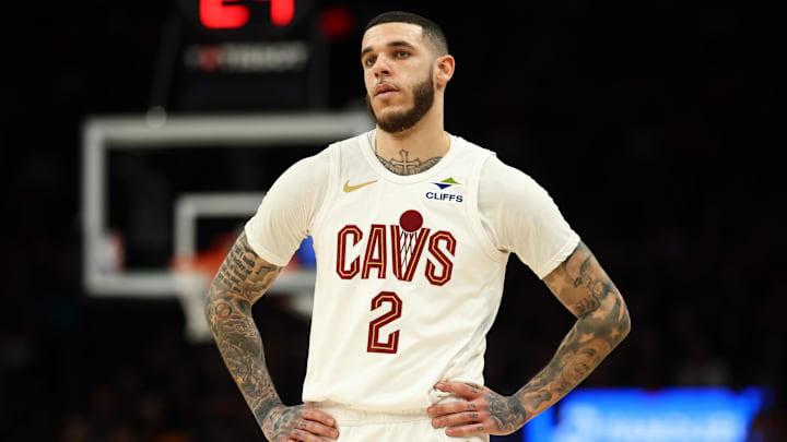 Jan 30, 2026; Phoenix, Arizona, USA; Cleveland Cavaliers guard Lonzo Ball (2) against the Phoenix Suns at Mortgage Matchup Center. Mandatory Credit: Mark J. Rebilas-Imagn Images