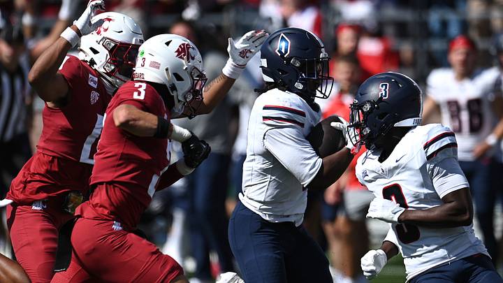 Duquesne Dukes running back Dazhaun Hopkins (0) is caught from behind by Washington State Cougars safety Jaylen Thomas (3) and cornerback CJ Solis-Lumar (0) during the first half at Gesa Field at Martin Stadium. Duquesne Dukes running back Dazhaun Hopkins (0) is caught from behind by Washington State Cougars safety Jaylen Thomas (3) and cornerback CJ Solis-Lumar (0) during the first half at Gesa Field at Martin Stadium.