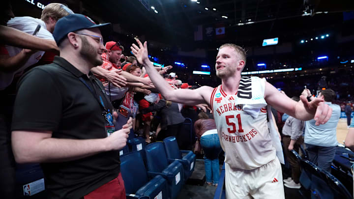 Nebraska's Rienk Mast (51) celebrates with fans during a second-round game in the NCAA men's basketball tournament between Nebraska Cornhuskers and Vanderbilt Commodores at Paycom Center in Oklahoma City, Saturday March 21, 2026.