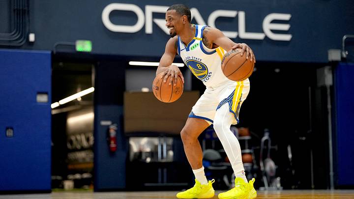 Sep 28, 2026; San Francisco, CA, USA;  Golden State Warriors guard De'Anthony Melton (8) dribbles two basketballs during Media Day at the Chase Center.  Mandatory Credit: Cary Edmondson-Imagn Images