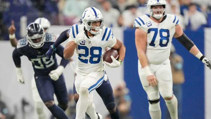 Indianapolis Colts running back Jonathan Taylor (28) rushes for a touchdown Sunday, Dec. 22, 2024, during a game against the Tennessee Titans at Lucas Oil Stadium in Indianapolis.