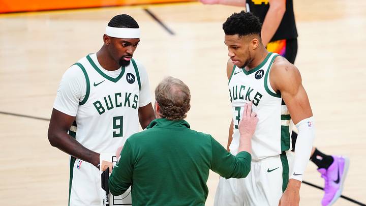 Jul 8, 2021; Phoenix, Arizona, USA; Milwaukee Bucks forward Giannis Antetokounmpo (34) and center Bobby Portis (9) with head coach Mike Budenholzer against the Phoenix Suns in game two of the 2021 NBA Finals at Phoenix Suns Arena. Mandatory Credit: Mark J. Rebilas-Imagn Images Jul 8, 2021; Phoenix, Arizona, USA; Milwaukee Bucks forward Giannis Antetokounmpo (34) and center Bobby Portis (9) with head coach Mike Budenholzer against the Phoenix Suns in game two of the 2021 NBA Finals at Phoenix Suns Arena. Mandatory Credit: Mark J. Rebilas-Imagn Images