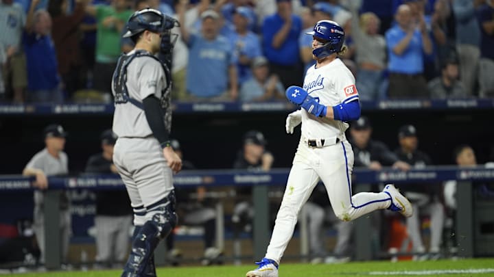 Oct 10, 2024; Kansas City, Missouri, USA; Kansas City Royals shortstop Bobby Witt Jr. (7) scores during the sixth inning against the New York Yankees during game four of the ALDS for the 2024 MLB Playoffs at Kauffman Stadium. Mandatory Credit: Jay Biggerstaff-Imagn Images Oct 10, 2024; Kansas City, Missouri, USA; Kansas City Royals shortstop Bobby Witt Jr. (7) scores during the sixth inning against the New York Yankees during game four of the ALDS for the 2024 MLB Playoffs at Kauffman Stadium. Mandatory Credit: Jay Biggerstaff-Imagn Images