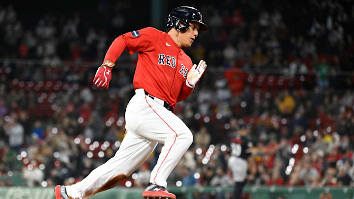 Sep 22, 2024; Boston, MA, USA; Boston Red Sox designated hitter Masataka Yoshida (7) scores on an RBI by catcher Connor Wong (12) (not pictured) during the sixth inning against the Minnesota Twins at Fenway Park. Mandatory Credit: Eric Canha-Imagn Images Sep 22, 2024; Boston, MA, USA; Boston Red Sox designated hitter Masataka Yoshida (7) scores on an RBI by catcher Connor Wong (12) (not pictured) during the sixth inning against the Minnesota Twins at Fenway Park. Mandatory Credit: Eric Canha-Imagn Images