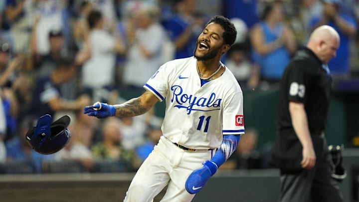 Jul 8, 2025; Kansas City, Missouri, USA; Kansas City Royals third baseman Maikel Garcia (11) celebrates as he scores the winning run during the ninth inning against the Pittsburgh Pirates at Kauffman Stadium. Mandatory Credit: Jay Biggerstaff-Imagn Images