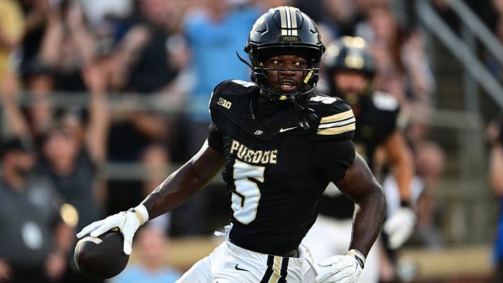 Purdue Boilermakers wide receiver Chauncey Magwood (5) carries the ball for a touchdown. Purdue Boilermakers wide receiver Chauncey Magwood (5) carries the ball for a touchdown.