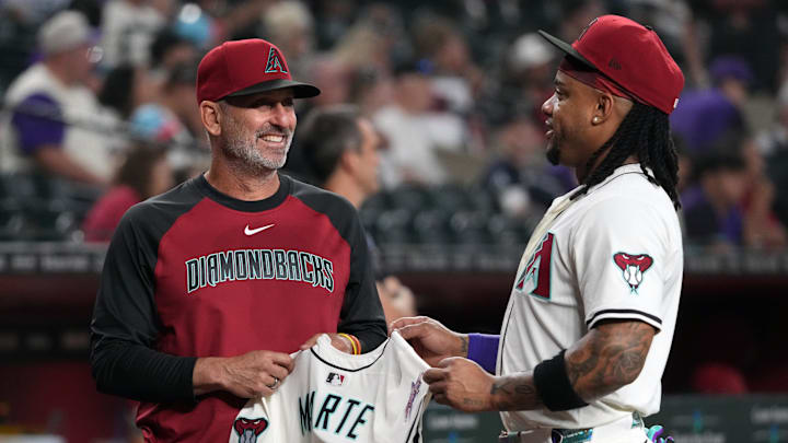 Jul 6, 2025; Phoenix, Arizona, USA; Arizona Diamondbacks manager Torey Lovullo (17) congratulates second base Ketel Marte (4) after making the All-star game in the first inning against the Kansas City Royals at Chase Field. Mandatory Credit: Rick Scuteri-Imagn Images Jul 6, 2025; Phoenix, Arizona, USA; Arizona Diamondbacks manager Torey Lovullo (17) congratulates second base Ketel Marte (4) after making the All-star game in the first inning against the Kansas City Royals at Chase Field. Mandatory Credit: Rick Scuteri-Imagn Images