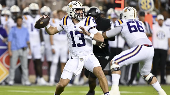 Oct 26, 2024; College Station, Texas, USA; LSU Tigers quarterback Garrett Nussmeier (13) looks to pass the ball in the first quarter against the Texas A&M Aggies. The Aggies defeated the Tigers 38-23; at Kyle Field. Mandatory Credit: Maria Lysaker-Imagn Images.  