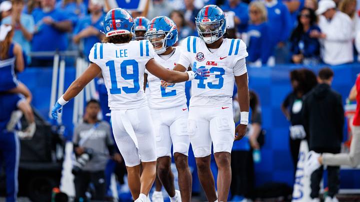 Mississippi Rebels quarterback Austin Simmons celebrates with wide receiver Cayden Lee after scoring a touchdown during the third quarter against the Kentucky Wildcats at Kroger Field. Mandatory Credit: Jordan Prather-Imagn Images Mississippi Rebels quarterback Austin Simmons celebrates with wide receiver Cayden Lee after scoring a touchdown during the third quarter against the Kentucky Wildcats at Kroger Field. Mandatory Credit: Jordan Prather-Imagn Images