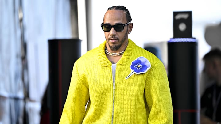 Oct 20, 2024; Austin, Texas, USA; Mercedes AMG Petronas F1 Team driver Lewis Hamilton (44) of Team Great Britain walks through the track entrance before the 2024 Formula One US Grand Prix at Circuit of the Americas. Mandatory Credit: Jerome Miron-Imagn Images