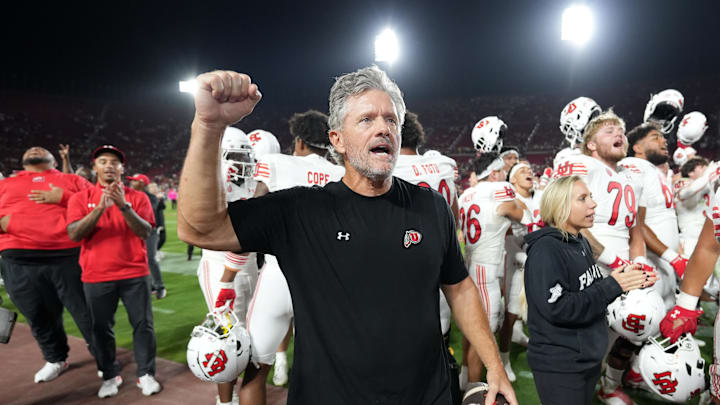 Utah Utes head coach Kyle Whittingham celebrates after the game against the Southern California Trojans at United Airlines Field at Los Angeles Memorial Coliseum. Utah Utes head coach Kyle Whittingham celebrates after the game against the Southern California Trojans at United Airlines Field at Los Angeles Memorial Coliseum.