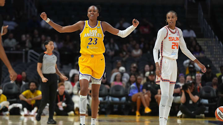 Sep 10, 2024; Los Angeles, California, USA; LA Sparks forward Azura Stevens (23) and Connecticut Sun forward DeWanna Bonner (24) react in the first half at Crypto.com Arena. Mandatory Credit: Kirby Lee-Imagn Images