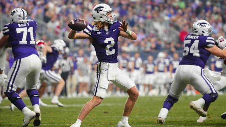 Kansas State quarterback Avery Johnson (2) throws a pass against Rutgers during second half of the Rate Bowl at Chase Field on Dec. 26, 2024, in Phoenix.