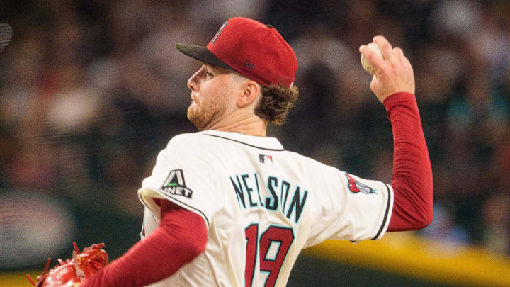 Aug 5, 2025; Phoenix, Arizona, USA; Arizona Diamondbacks pitcher Ryne Nelson (19) in action during the fifth inning against the San Diego Padres at Chase Field. Mandatory Credit: Allan Henry-Imagn Images Aug 5, 2025; Phoenix, Arizona, USA; Arizona Diamondbacks pitcher Ryne Nelson (19) in action during the fifth inning against the San Diego Padres at Chase Field. Mandatory Credit: Allan Henry-Imagn Images