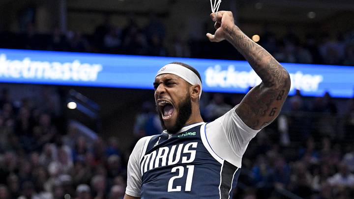 Dec 18, 2025; Dallas, Texas, USA; Dallas Mavericks forward Daniel Gafford (21) reacts after he dunks the ball against the Detroit Pistons during the second quarter at the American Airlines Center. Mandatory Credit: Jerome Miron-Imagn Images Dec 18, 2025; Dallas, Texas, USA; Dallas Mavericks forward Daniel Gafford (21) reacts after he dunks the ball against the Detroit Pistons during the second quarter at the American Airlines Center. Mandatory Credit: Jerome Miron-Imagn Images