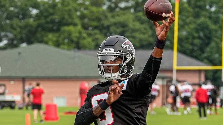 Jul 29, 2026; Atlanta, Falcons, USA; Atlanta Falcons quarterback Michael Penix Jr passes during the first day of training camp at IBM Performance Field. Mandatory Credit: Dale Zanine-Imagn Images