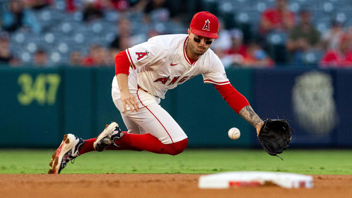 Sep 14, 2024; Anaheim, California, USA; Los Angeles Angels shortstop Zach Neto (9) fields a ground ball during the 1st inning against the Houston Astros at Angel Stadium. Mandatory Credit: Jason Parkhurst-Imagn Images Sep 14, 2024; Anaheim, California, USA; Los Angeles Angels shortstop Zach Neto (9) fields a ground ball during the 1st inning against the Houston Astros at Angel Stadium. Mandatory Credit: Jason Parkhurst-Imagn Images