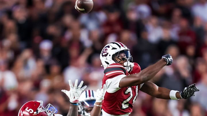 Oct 25, 2025; Columbia, South Carolina, USA; South Carolina Gamecocks defensive back Jalon Kilgore (24) tips away a pass intended for Alabama Crimson Tide wide receiver Germie Bernard (5) in the second half at Williams-Brice Stadium. Mandatory Credit: Jeff Blake-Imagn Images