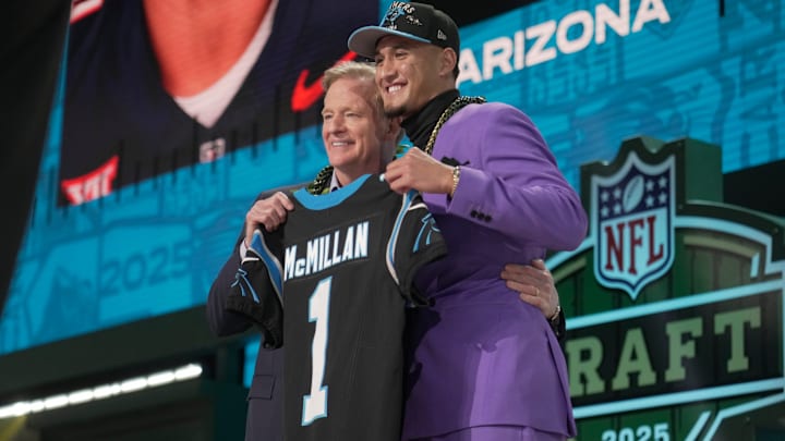 NFL Commissoner Rodger Goodell, left, with Arizona Wildcats wide receiver Tetairoa McMillan selected by the Carolina Panthers as the number eight pick in the first round of the 2025 NFL Draft at Lambeau Field.