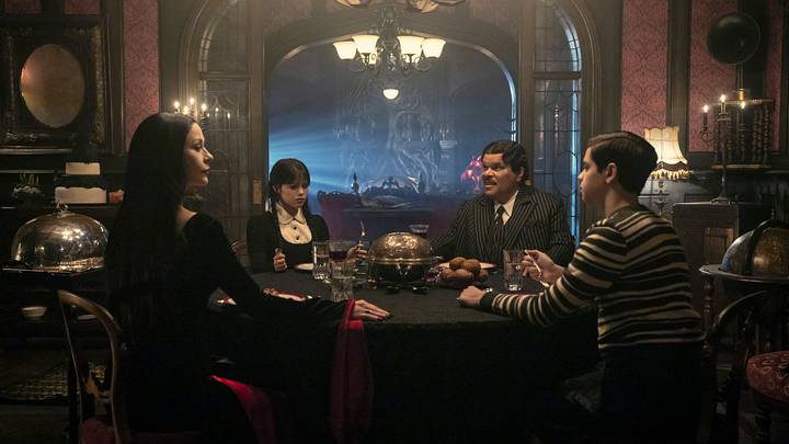 Wednesday. (L to R) Catherine Zeta-Jones as Morticia Addams, Jenna Ortega as Wednesday Addams, Luis Guzmán as Gomez Addams, Isaac Ordonez as Pugsley Addams in episode 206 of Wednesday. Cr. Helen Sloan/Netflix © 2025 Wednesday. (L to R) Catherine Zeta-Jones as Morticia Addams, Jenna Ortega as Wednesday Addams, Luis Guzmán as Gomez Addams, Isaac Ordonez as Pugsley Addams in episode 206 of Wednesday. Cr. Helen Sloan/Netflix © 2025