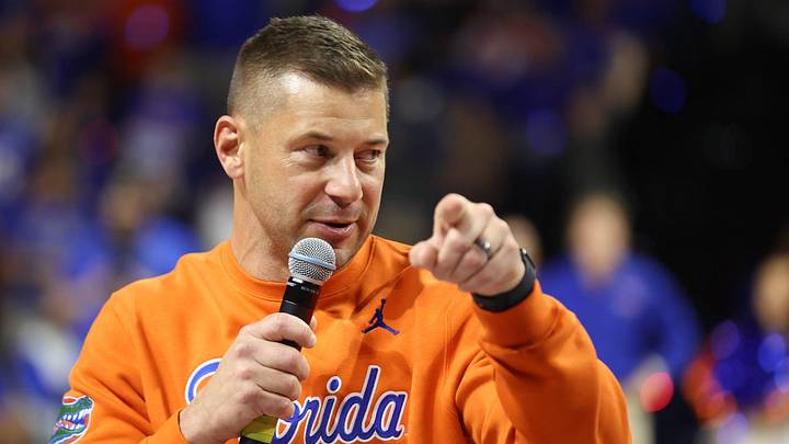 New Gator head football coach Jon Sumrall fires up the crowd during the first half an NCAA basketball game at Steven C. O'Connell Center Exactek arena in Gainesville, FL on Saturday, January 24, 2026. Auburn won 76-67 [Alan Youngblood/Gainesville Sun]