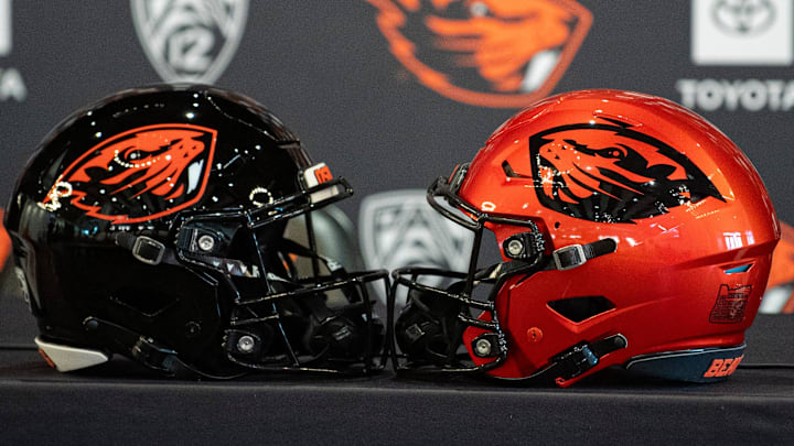Oregon State football helmets sit on a table before the introductory press conference of the hiring of its new head football coach, JaMarcus Shephard, at Reser Stadium on Tuesday, Dec. 2, 2025, in Corvallis, Ore.