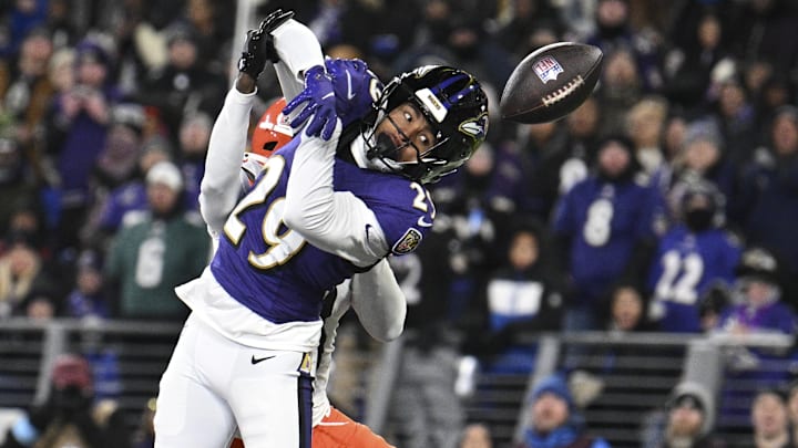 Jan 4, 2025; Baltimore, Maryland, USA;  Baltimore Ravens safety Ar'Darius Washington (29) breaks up a pass intended for Cleveland Browns wide receiver Jerry Jeudy (3) in the end zone at M&T Bank Stadium. Mandatory Credit: Tommy Gilligan-Imagn Images