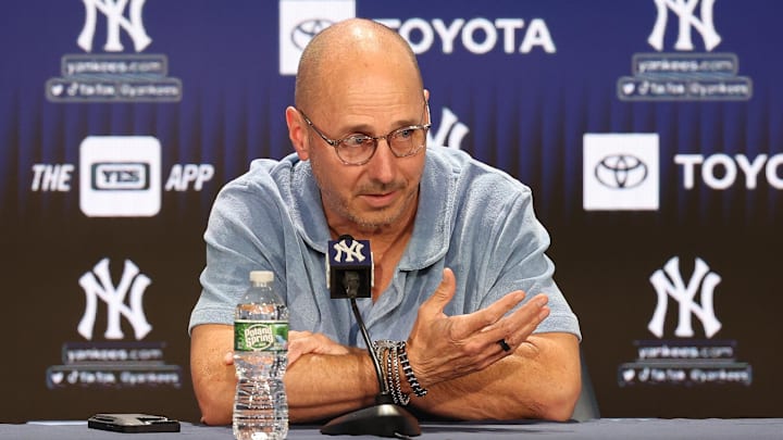 Aug 23, 2023; Bronx, New York, USA; New York Yankees general manager Brian Cashman talks with the media before the game between the Yankees and the Washington Nationals at Yankee Stadium. Mandatory Credit: Vincent Carchietta-Imagn Images