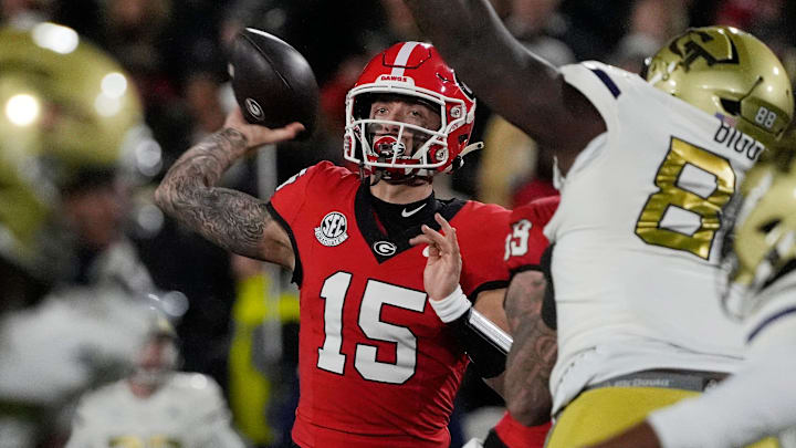 Georgia quarterback Carson Beck (15) throws the ball during the first half of a NCAA college football game against Georgia Tech in Athens, Ga., on Friday, Nov. 29, 2024.