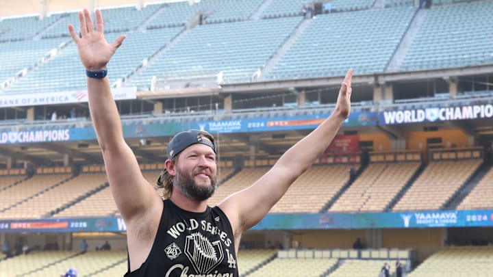 Dodgers pitcher Clayton Kershaw waves to the crowd during the 2025 World Series championship celebration at Dodger Stadium in Los Angeles on Monday, Nov. 3, 2025. Dodgers pitcher Clayton Kershaw waves to the crowd during the 2025 World Series championship celebration at Dodger Stadium in Los Angeles on Monday, Nov. 3, 2025.