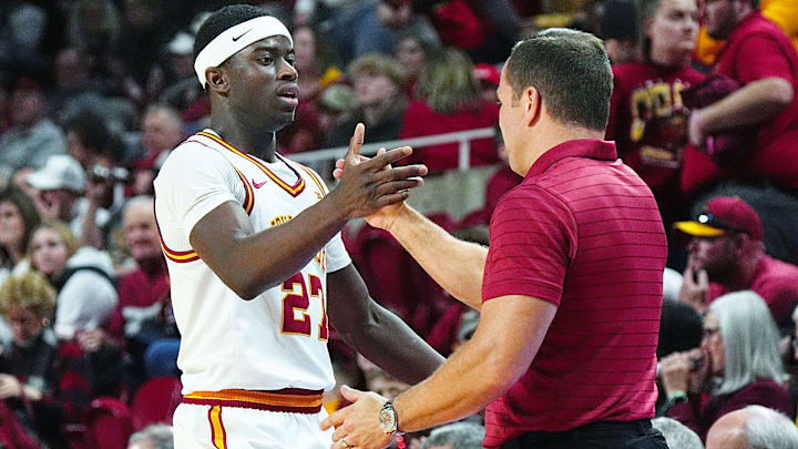Iowa State Cyclones forward Killyan Toure (27) gets congratulation from men's basketball head coach T.J. Otzelberger during the second half against UCF in the Big-12 conference game on Jan. 20, 2026, at Hilton Coliseum in Ames, Iowa.