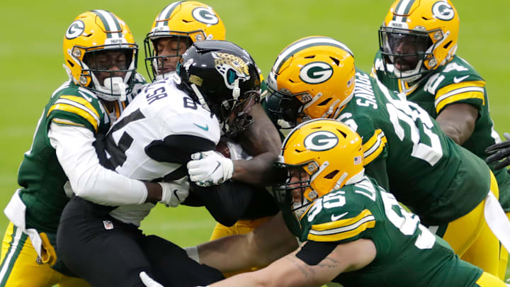 Jacksonville Jaguars wide receiver Keelan Cole (84) is brought down by the Green Bay Packers defense during the first quarter on November 15, 2020, at Lambeau Field in Green Bay, Wis.