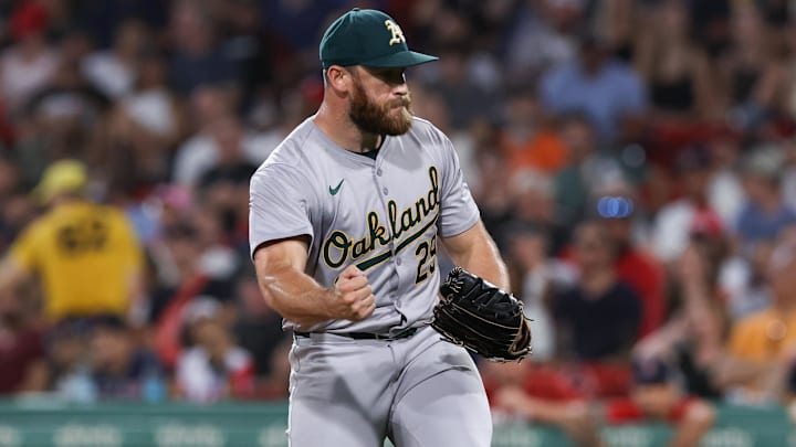 Jul 10, 2024; Boston, Massachusetts, USA; Oakland Athletics relief pitcher Austin Adams (29) reacts during the sixth inning against the Boston Red Sox at Fenway Park. Mandatory Credit: Paul Rutherford-Imagn Images