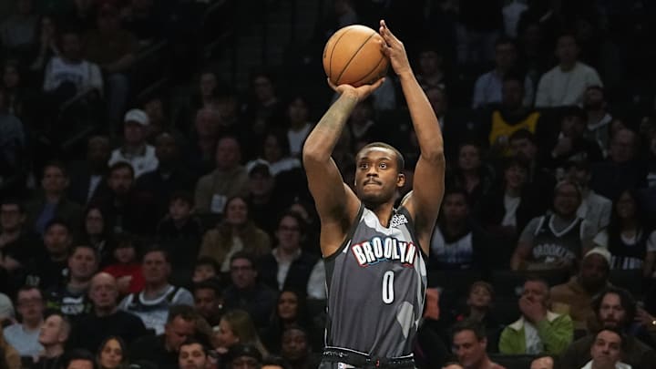 Apr 3, 2025; Brooklyn, New York, USA; Brooklyn Nets forward Dariq Whitehead (0) shoots a three point jump shot against the Minnesota Timberwolves during the first half at Barclays Center. Mandatory Credit: Gregory Fisher-Imagn Images