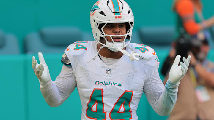 Nov 24, 2024; Miami Gardens, Florida, USA; Miami Dolphins linebacker Chop Robinson (44) reacts after attempting to recover a fumble against the New England Patriots during the second quarter at Hard Rock Stadium. Mandatory Credit: Sam Navarro-Imagn Images