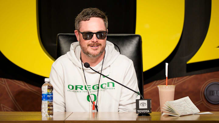 Oregon head coach Dan Lanning speaks from the podium at the Hatfield-Dowlin Complex on the first day of spring practice for the Oregon Ducks on March 12, 2026, in Eugene, Oregon. Oregon head coach Dan Lanning speaks from the podium at the Hatfield-Dowlin Complex on the first day of spring practice for the Oregon Ducks on March 12, 2026, in Eugene, Oregon.