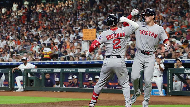 Boston Red Sox players Roman Anthony and Alex Bregman celebrate against the Houston Astros.