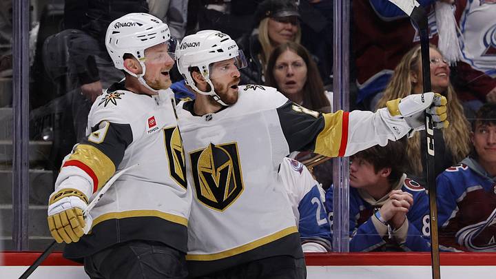May 20, 2026; Denver, Colorado, USA; Vegas Golden Knights center Nic Dowd (26) celebrates with center Jack Eichel (9)after scoring during the third period against the Colorado Avalanche in game one of the Western Conference Final of the 2026 Stanley Cup Playoffs at Ball Arena. Mandatory Credit: Isaiah J. Downing-Imagn Images