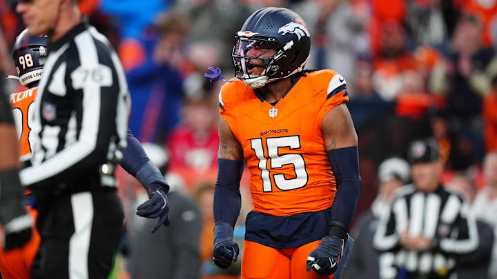 Nov 17, 2024; Denver, Colorado, USA; Denver Broncos linebacker Nik Bonitto (15) celebrates his sack in the second half against the Atlanta Falcons at Empower Field at Mile High. Mandatory Credit: Ron Chenoy-Imagn Images