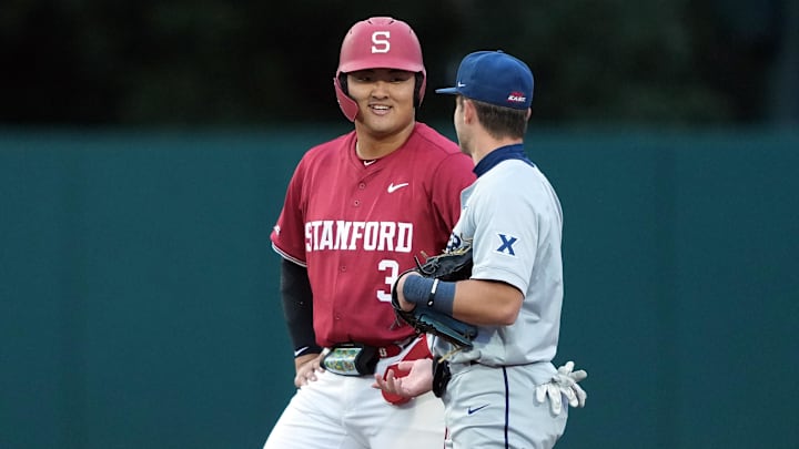 Mar 1, 2025; Stanford, CA, USA; Stanford Cardinal first baseman Rintaro Sasaki (3) talks with Xavier Musketeers second baseman Nolan Tucker (right) during the third inning at Sunken Diamond. Mandatory Credit: Darren Yamashita-Imagn Images