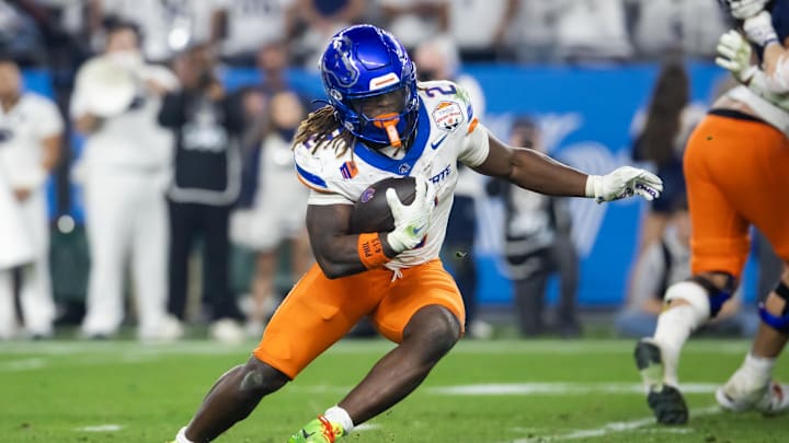 Dec 31, 2024; Glendale, AZ, USA; Boise State Broncos running back Ashton Jeanty (2) against the Penn State Nittany Lions during the Fiesta Bowl at State Farm Stadium. Mandatory Credit: Mark J. Rebilas-Imagn Images