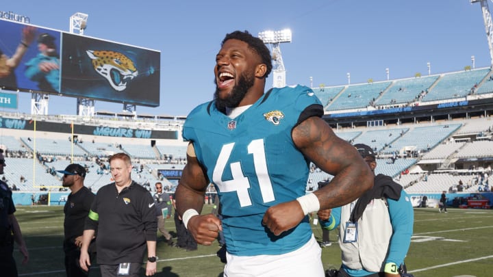 Dec 31, 2023; Jacksonville, Florida, USA; Jacksonville Jaguars outside linebacker Josh Allen (41) celebrates the win against the Carolina Panthers at EverBank Stadium. Mandatory Credit: Morgan Tencza-USA TODAY Sports